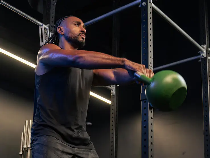 Entraînement kettlebell dynamique Atlas Gym